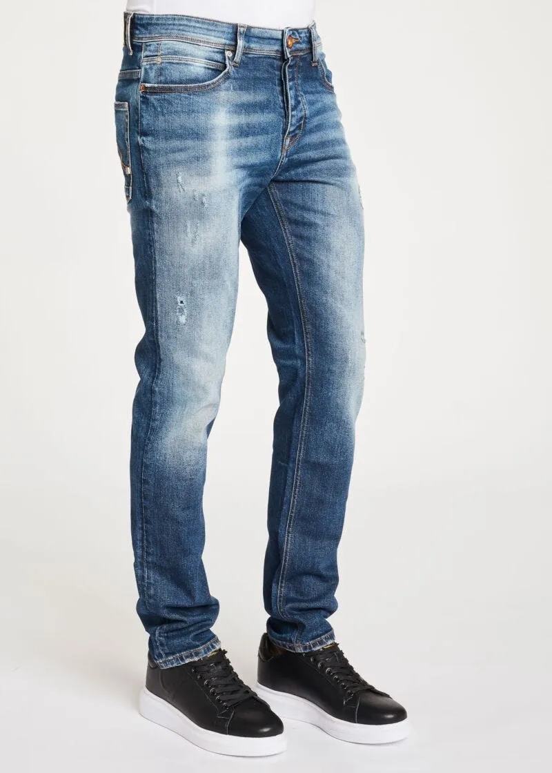 Jeans con dettagli destroyed