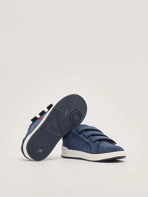POLO RALPH LAUREN  Sneakers bambino Polo Ralph Lauren Heritage Court III in simil pelle con logo a contrasto Blu